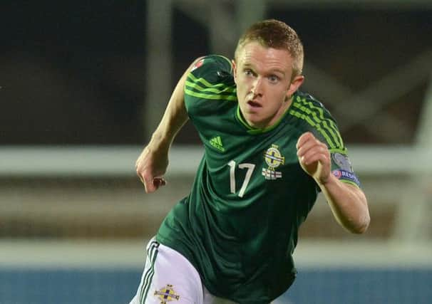 Shane Ferguson was named in the Northern Ireland squad yesterday despite his injury. Picture: Getty