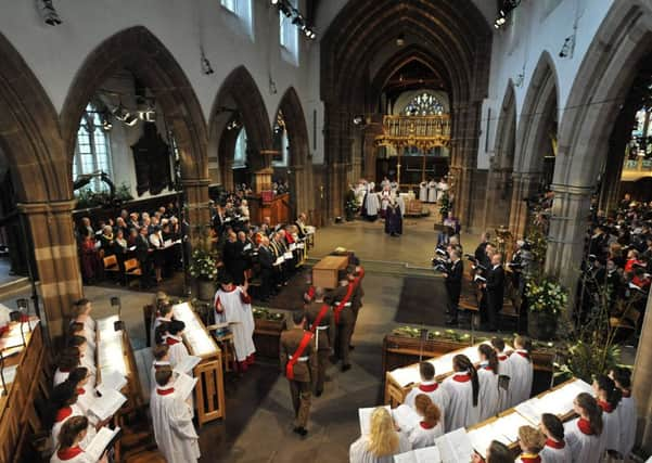 The coffin of Richard III is carried by the military bearer party during a reburial service at Leicester Cathedral. Picture: PA