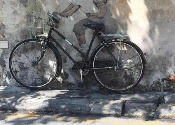 George Town, Penang

Little Children on a Bicycle, Armenian Street