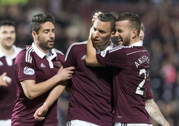 08/04/15 SCOTTISH CHAMPIONSHIP 
HEARTS v ALLOA 
TYNECASTLE - EDINBURGH 
Hearts' Soufian El Hassnaoui (centre) celebrates with his team-mates having scored the third for his side