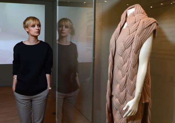 The museums Georgina Ripley next to one of the exhibits. Picture: Neil Hanna