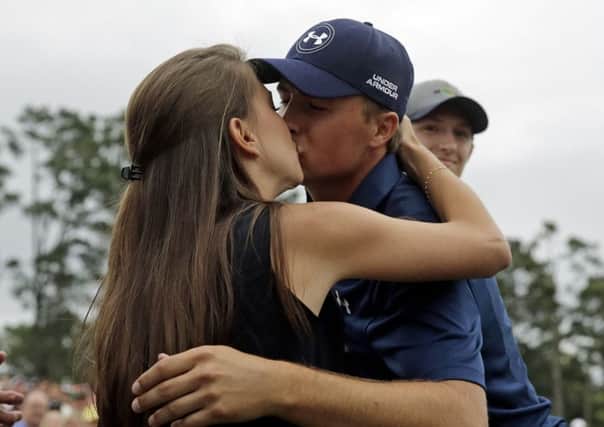A kiss for girlfriend Annie Verret. Picture: AP