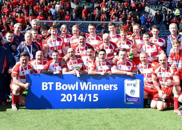 Alloa celebrate winning the BT Bowl Final. Picture: SNS