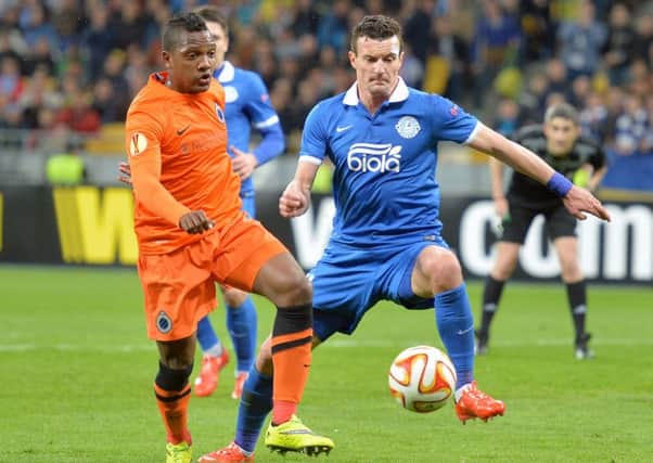 FC Dnipro's Artem Fedetskiy (R) vies with Brugge's Jose Izquierdo (L) Picture: AFP/Getty