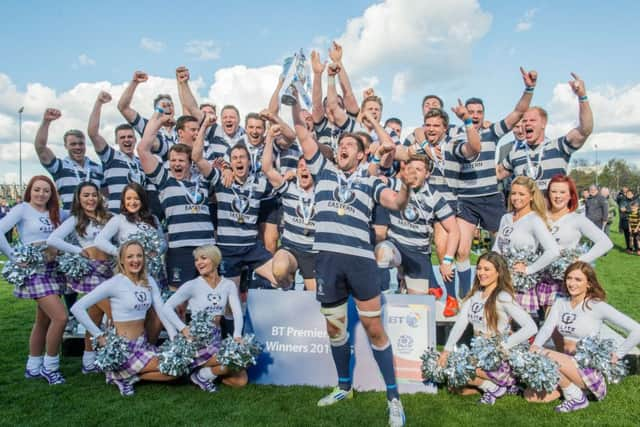 Jack Turley lifts the league trophy aloft. Picture: Ian Georgeson