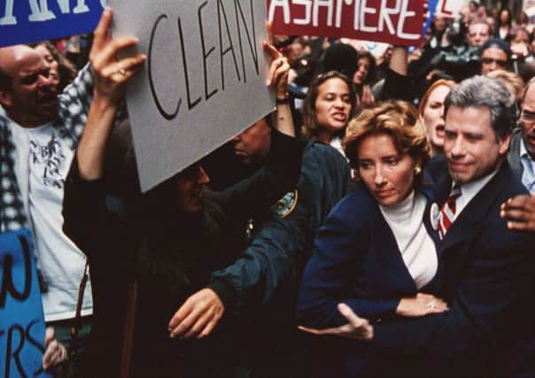 Emma Thompson and John Travolta in 1998 film Primary Colors. Picture: Kobal