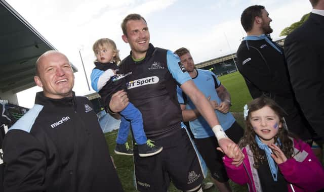 Al Kellock, who was honoured this week at the Pro12 awards, celebrates Glasgows win over Ulster with Gregor Townsend. Picture: SNS/SRU