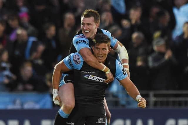 DTH van der Merwe with Stuart Hogg after scoring his vital try. Picture: SNS/SRU