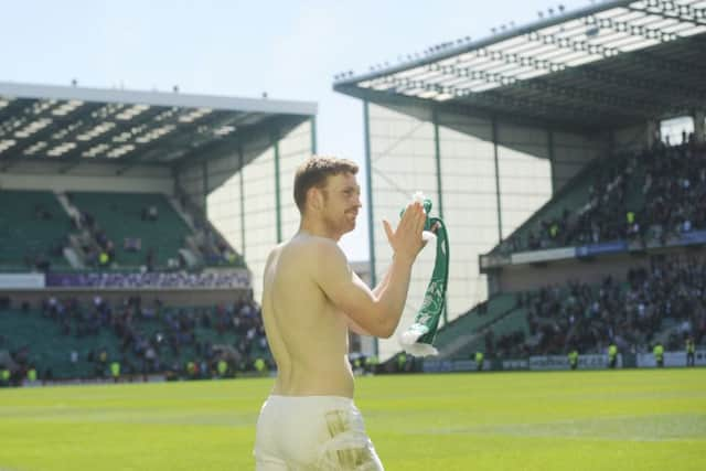 Liam Craig salutes the Hibernian faithful. Picture: Greg Macvean