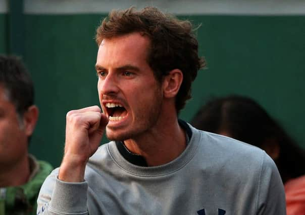 Andy Murray cheers on fellow Brit Kyle Edmund at Roland Garros. Picture: Getty