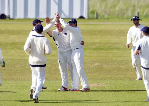 Scotland bowler Richie Berrington, centre, celebrates after dismissing Afghanistans Izatullah Dawlatzai. Picture: Donald MacLeod