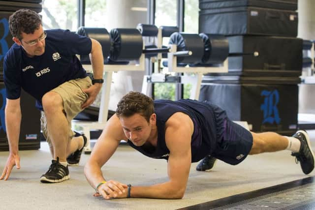 Wasps and Scotland stand-off Ruaridh Jackson is put through his paces by Scotland physiotherapist Stephen Mutch. Picture: SNS