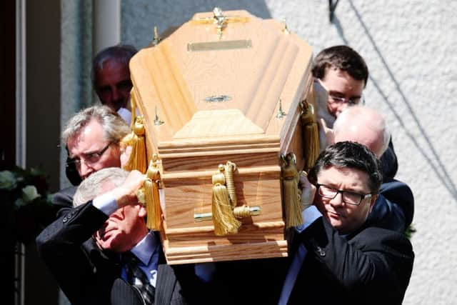 Pallbearers carry the coffin of former Liberal Democrat leader Charles Kennedy. Picture: Getty