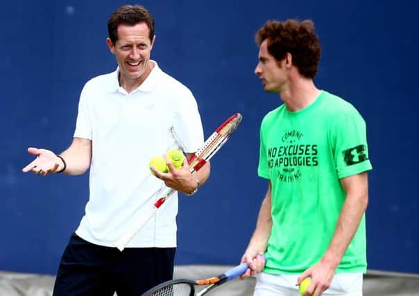 Andy Murray talks with coach Jonas Bjorkman at Queens Club. Picture: Getty Images