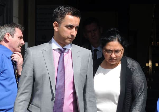 The Chhokar family's solicitor, Aamer Anwar, and Manjit Sangha, the sister of Surjit Singh Chhokar. Picture: PA