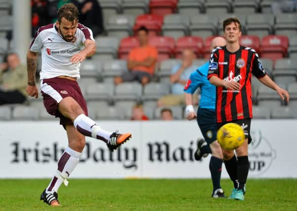 Defensive signing, Blazej Augustyn, fires in a shot. Picture credit: Sam Barnes / SPORTSFILE