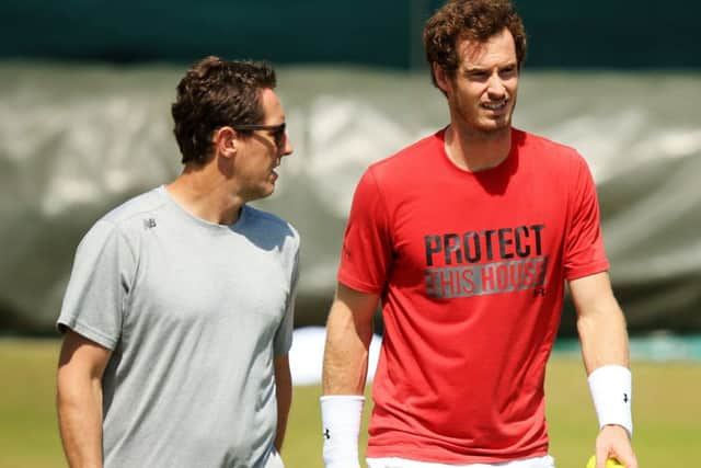 Andy Murray and Jonas Bjorkman (left) during Friday's practice session. Picture: PA