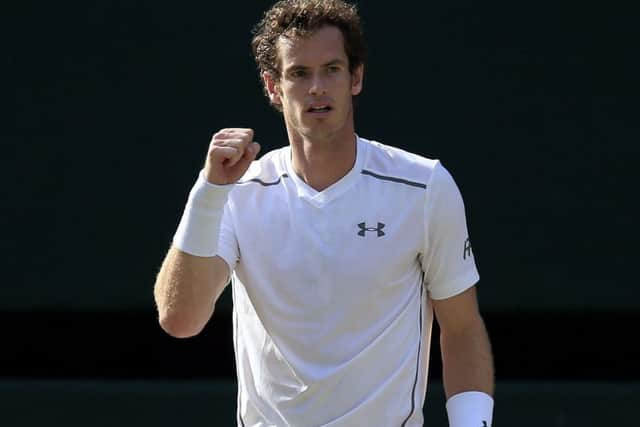 Andy Murray is through to the quarter-finals after defeating Ivo Karlovic. Picture: PA