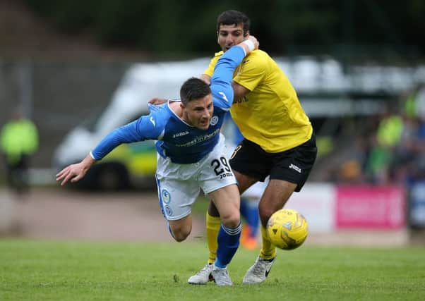 Michael O'Halloran competes with Gevorg Poghosyan of Alashkert. Picture: Getty