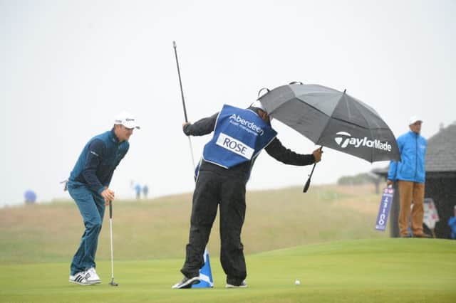 Englands Justin Rose putts on the third green during the second round of the Aberdeen Asset Management Scottish Open at Gullane. Picture: Jane Barlow