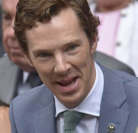 Benedict Cumberbatch sits in the royal box on Centre Court during the men's singles final between Roger Federer and Novak Djokovic. Picture: AP