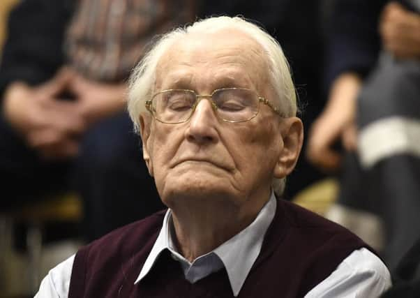 Former SS sergeant Oskar Groening listens to the verdict yesterday. Picture: AP