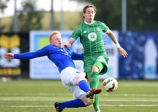 Stefan Johansen is challenged by Stjarnans Thorri Geir Runarsson during Celtics victory in Iceland on Wednesday. Pitcure: SNS Group