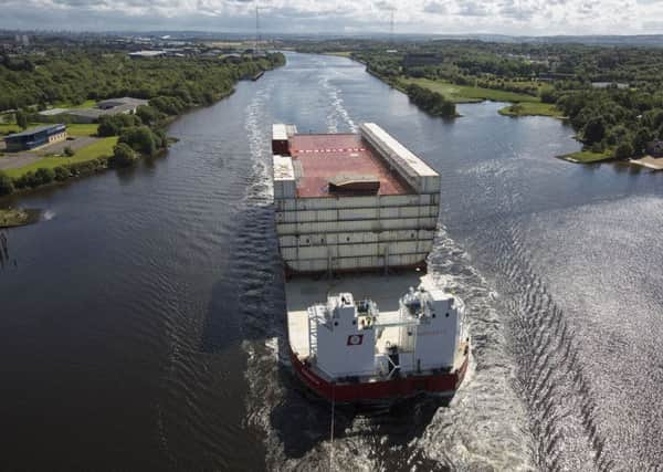 The largest and one of the last sections of the HMS Prince of Wales which has departed Glasgow by barge on a 600 mile journey to Rosyth. Picture: PA