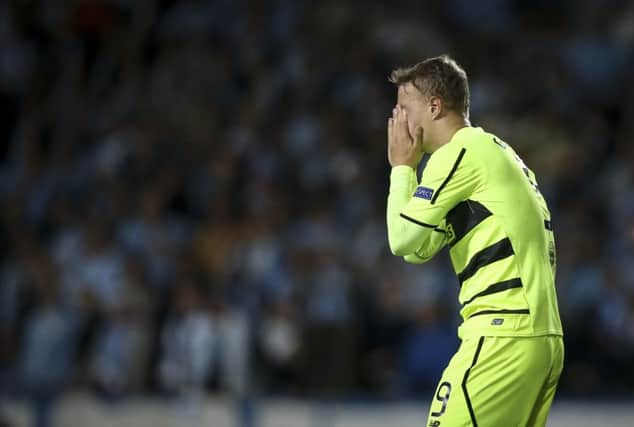 Celtic's forward Leigh Griffiths holds his head in his hands as the Scottish Champions miss out on a place among Europe's elite. Picture: Getty