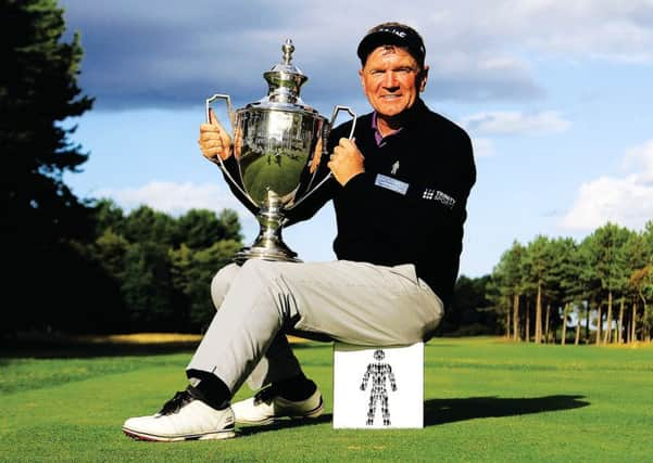 Paul Broadhurst poses with the trophy after winning the Scottish Senior Open following a play-off against Gordon Manson. Picture: Getty Images