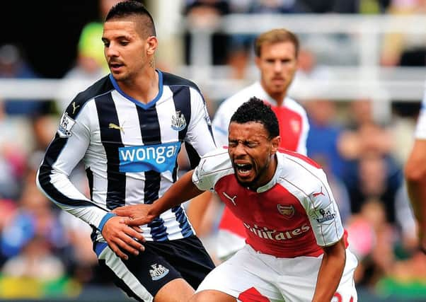 Aleksandar Mitrovic fouls Francis Coquelin  resulting in a red card. Picture: Getty