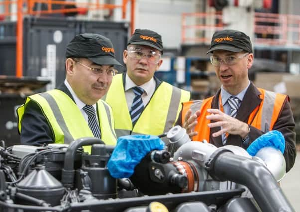 Kazakh ambassador Erzhan Kazykhanov (L) with Jim Kilpatrick, Head of Manufacturing at Aggreko. Picture: Peter Devlin