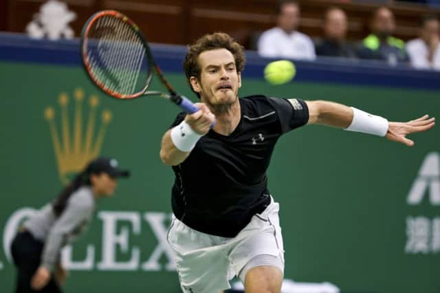 Scotlands Andy Murray reaches for a forehand return during his straight-sets victory over American Steve Johnson yesterday. Picture: AP