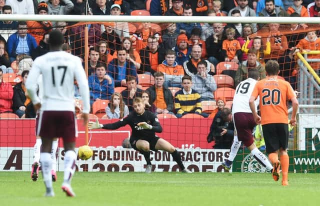 Hearts Juanma Delgado fires the ball into the net. Picture: SNS