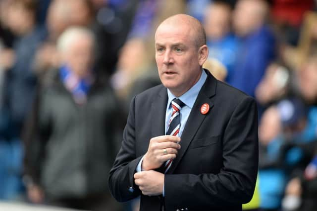 Mark Warburton watched on as Rangers came from behind to defeat Queen of the South on Saturday. Picture: SNS