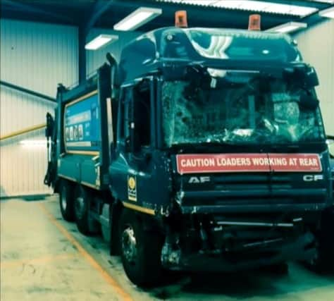 Damage to the bin lorry taken from FAI footage. Picture: Hemedia