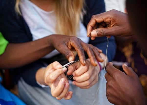 Joining hands with people in Malawi has helped to make a difference to many lives. Picture: Contributed