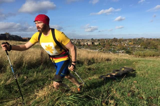 Luke Robertson's training regime has included dragging tyres up Blackford Hill, Edinburgh. Photo: Hazel Clyne