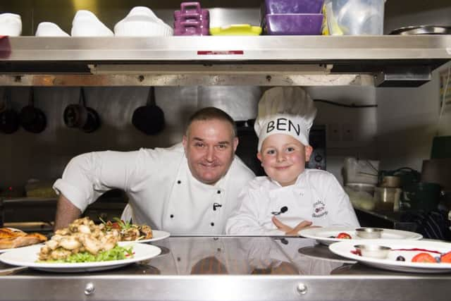 Ben and head chef Andrew Stott at Le Bistro Beaumartin Picture: Richard Campbell