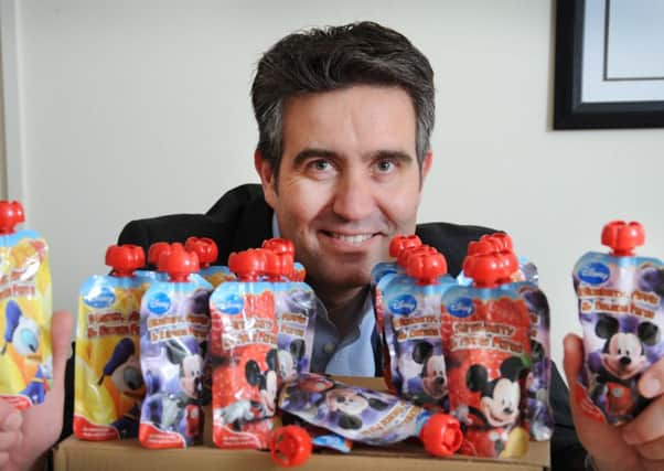 JW Filshill's Chris Miller with the wholesaler's Disney-branded drinks