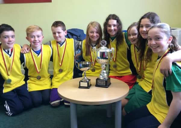 Hilton Primary Schol Under-12s with their cups and medals