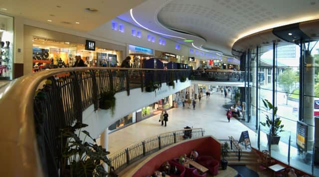 The woman allegedly pushed the dinner set off a 18ft balcony at the Overgate Centre in Dundee before walking to her car. Picture: TSPL