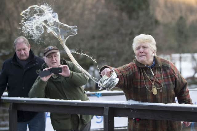 Lord provost of Perth and Kinross Liz Grant toasts the river Tay in Kenmore to bless the water for the new season. Picture: PA