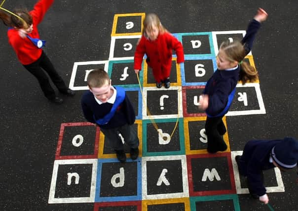 Children playing hopscotch