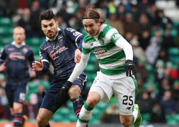 Celtic's Stefan Johansen (right) looked back to his best against Ross County. Picture: PA