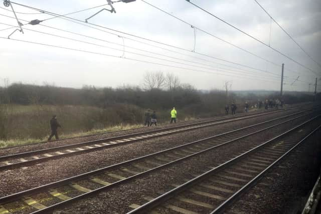 Steam enthusiasts taking pictures on the tracks disrupted the inaugural run of the Flying Scotsman. Picture: PA