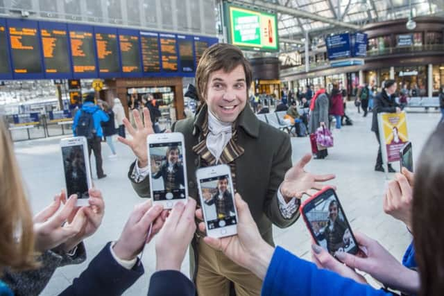 Robert Burns at Glasgow Central Station encouraging people from Glasgow to visit the Robert Burns Memorial Museum Picture: 

Lenny Warren / Warren Media