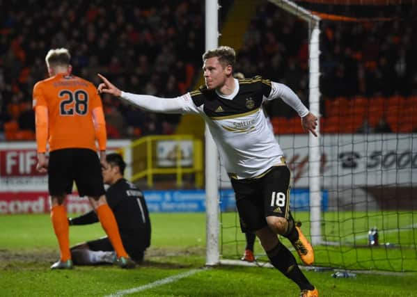 Aberdeen's Simon Church celebrates after scoring his side's winning goal. Picture: SNS