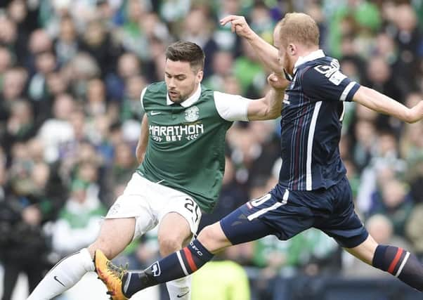 McGregor, left, a Hibs fan, took Sunday's loss as hard as anyone. Picture: Greg Macvean