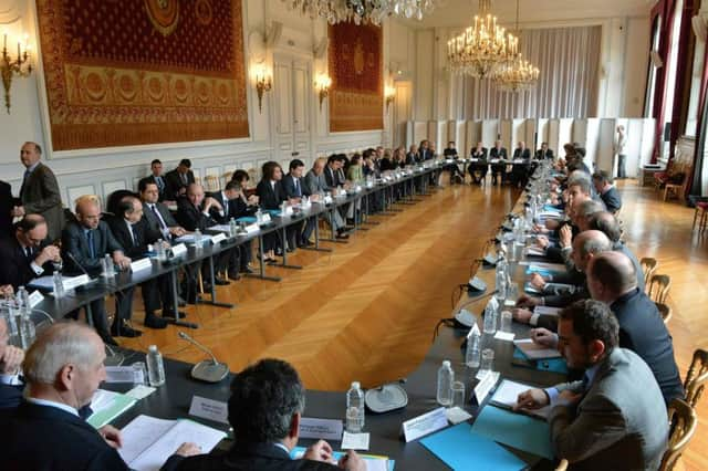 Participants are pictured at the interior ministry in Paris yesterday prior to a meeting to discuss the security measures for Euro 2016. Picture: AFP/Getty